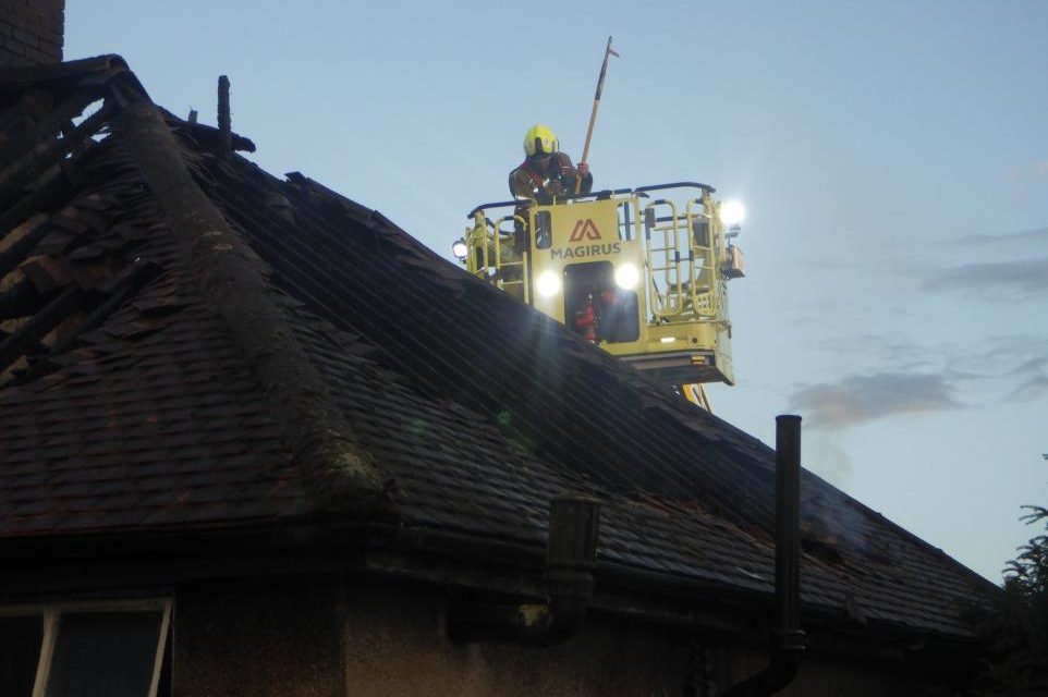 Fire destroys house roof